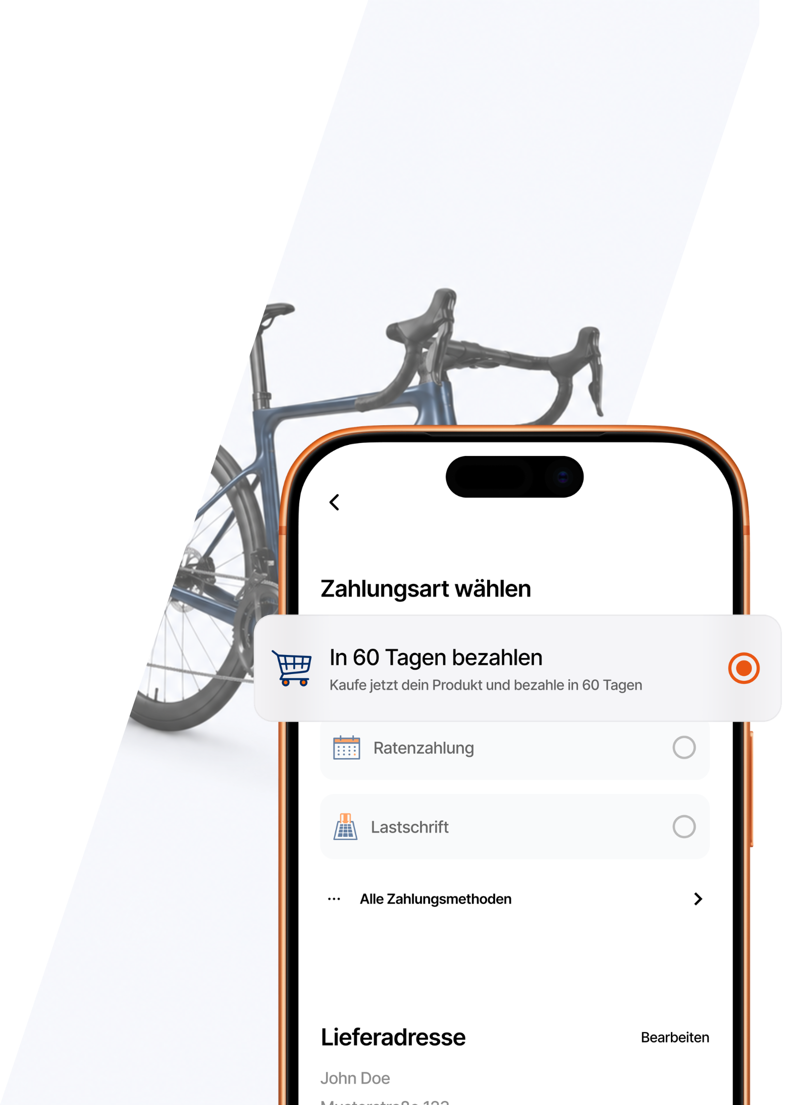 Smartphone mit ausgewählter Buy-Now-Pay-Later-Zahlungsart „In 60 Tagen bezahlen“ beim Onlinekauf eines Fahrrads.